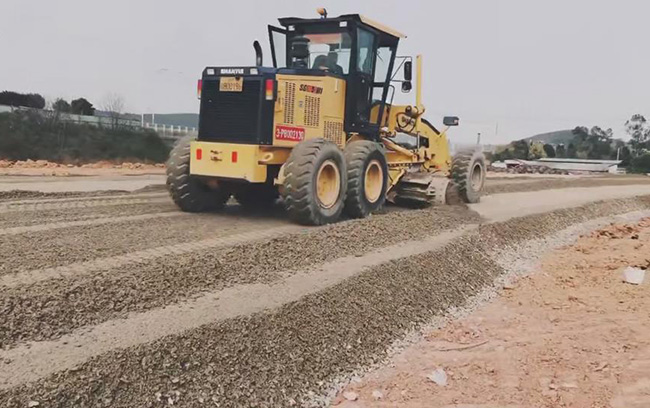 SG18-3平地机蹊径施工路基石子散救济工-平地机-永利集团股份